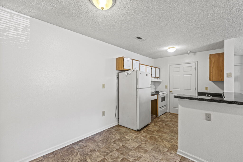 Mallard Cove Apartments Distant view of kitchen