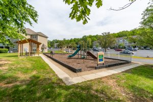 Stafford Lakes Apartments playground and seating area